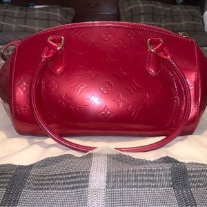 Louis Vuitton Pomme D'Amour Monogram
Vernis Sherwood PM Bag